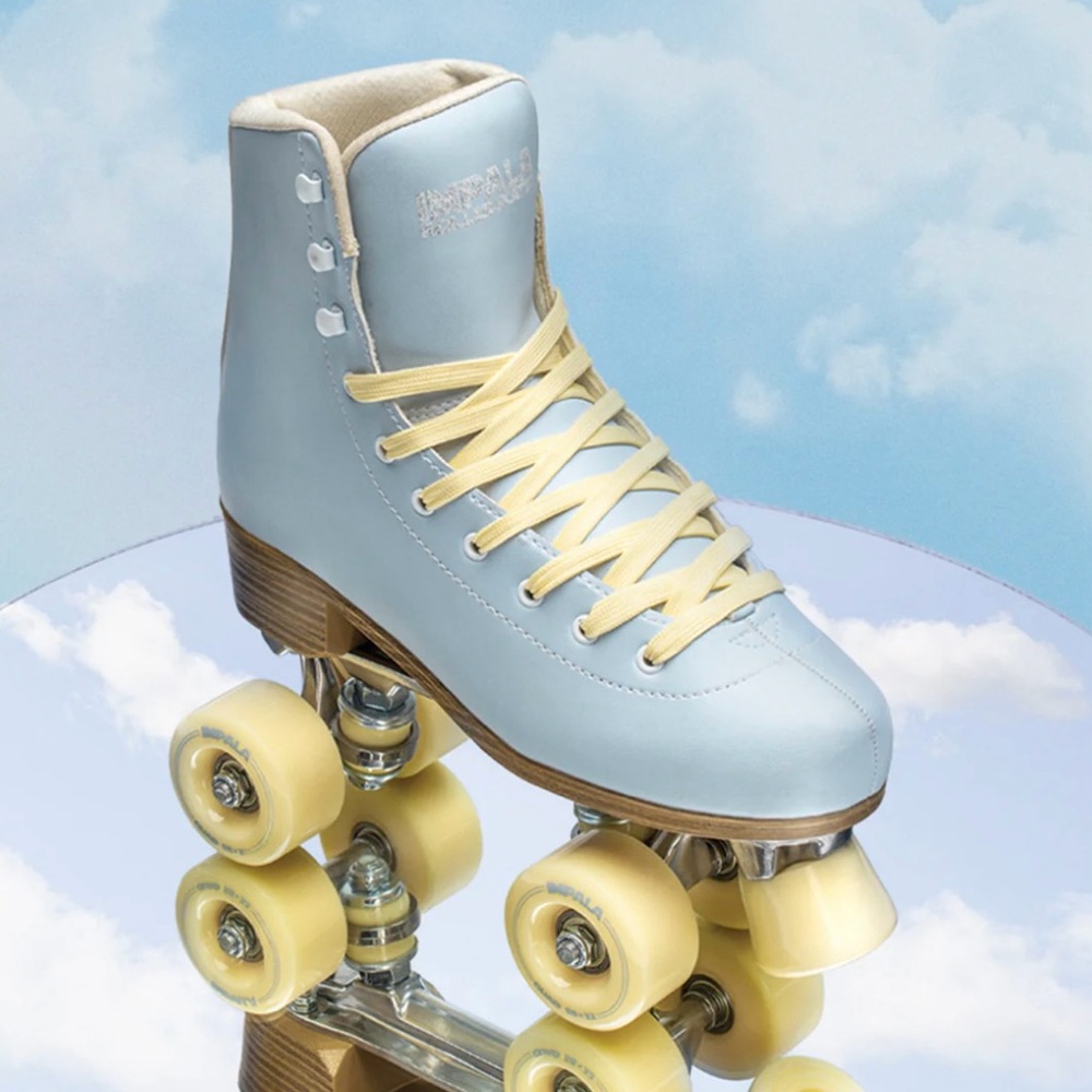 Light Blue Roller Skates with Yellow Wheels